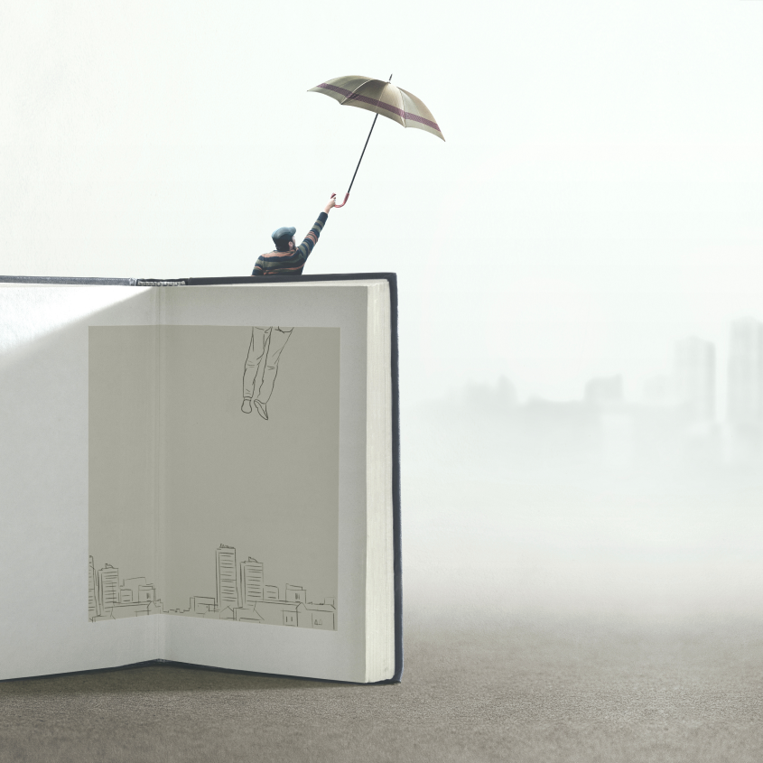 A man flies out of the pages of a book, while holding an umbrella