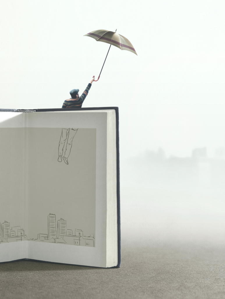 A man flies out of the pages of a book, while holding an umbrella